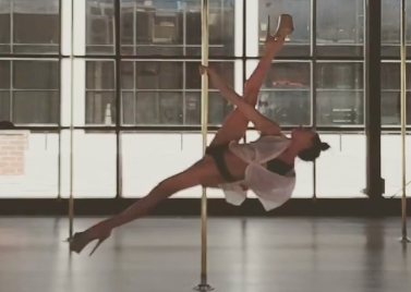 image of video pole dancing at The Pole Room CBD studio wearing heels and white shirt