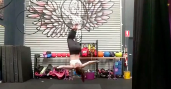 video image of woman dynamic hoop training at The Pole Room studio, aerial silk classes, aerial fitness, aerial silks