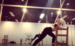 video image of woman performing chair and lap routine in studio